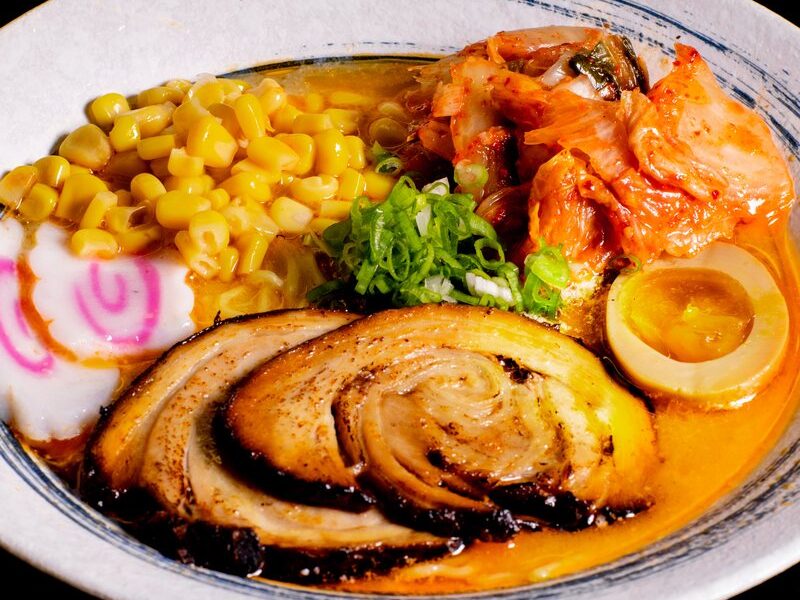 Spicy kimchi ramen with chashu, corn, kimchi and a soft-boiled egg